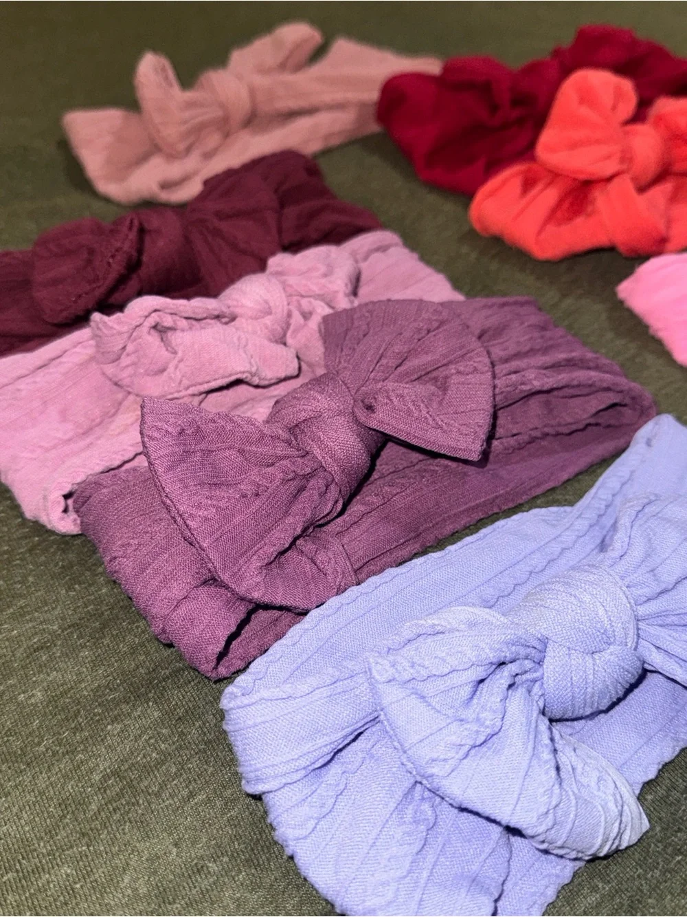 Cable knit (10) bows - purples and pinks/reds USED
